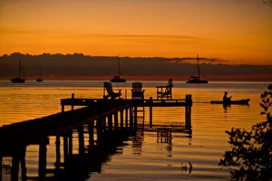 Russell Young Gallery: Jetty at sunset, Caye Caulker, Belize