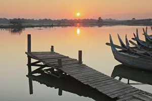 Jetty Prints: Jetty a traditional painted fishing boats at sunrise