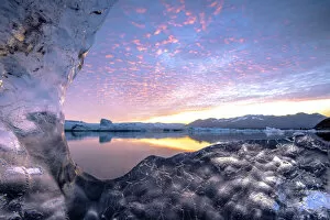 Images Dated 5th August 2016: Jokulsarlon glacier lagoon, East Iceland. The lagoon seen from a transparent block of ice