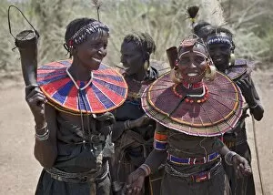 Leather Collection: Jovial Pokot women celebrate an Atelo ceremony. The Pokot are pastoralists speaking a Southern