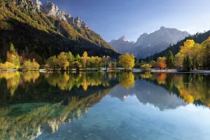 Kranjska Gora Prints: Julian Alps and trees reflecting in Lake Jasna in autumn, near Kranjska Gora, Slovenia