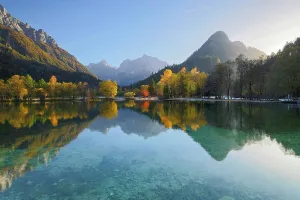 Kranjska Gora Prints: Julian Alps and trees reflecting in Lake Jasna in autumn, near Kranjska Gora, Slovenia