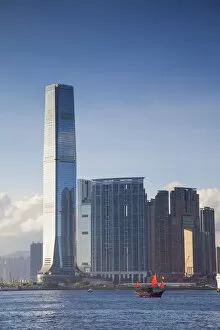 Images Dated 2nd July 2014: Junk boat passing International Commerce Centre (ICC), West Kowloon, Hong Kong