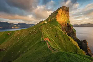 Coast Line Prints: Kallur lighthouse on the island of Kalsoy during a clear late summer sunset. Faroe Islands