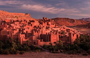 North African Prints: Kasbah Ait Ben Haddou bathed in light from the dawn sky, near Ouarzazate, Morocco