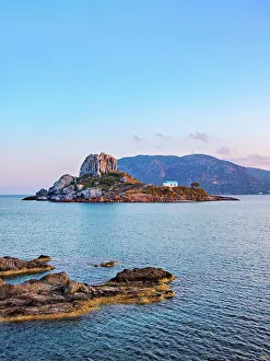 Kastri Island seen from Agios Stefanos Beach at sunset, Kamari Bay, Kos Island, Dodecanese, Greece