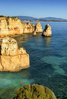 Kayak Prints: Kayaker along Coastline at Ponta da Piedade, Algarve, Portugal