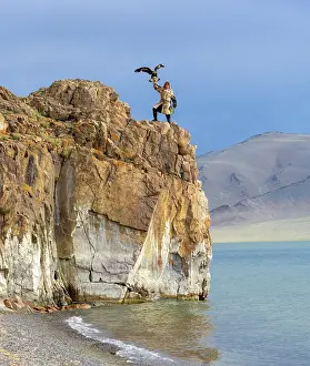 Clifftop Prints: Kazakh Eagle with his trained golden eagle