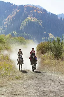 Show Collection: Kazakhstan, Almaty, a couple of Kazakhs ride their horses