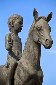 Kazakhstan, Almaty, Respublika Alangy Soviet created ceremonial square Statue of girl