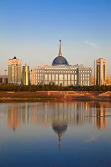 Images Dated 7th November 2011: Kazakhstan, Astana, City skyline reflecting in Isahim River