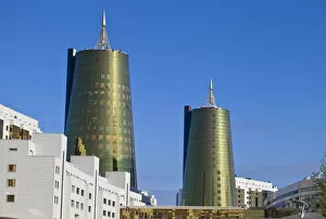 Images Dated 7th November 2011: Kazakhstan, Astana, House of Ministries and twin golden conical business centres the
