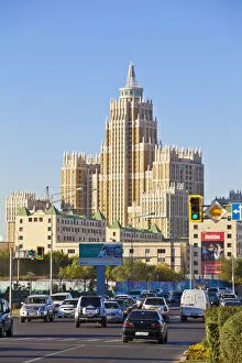 Images Dated 7th November 2011: Kazakhstan, Astana, Traffic on road by Triumph of Astana - a 480-apartment housing estate