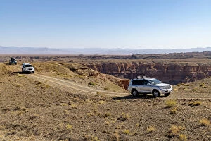 Images Dated 29th November 2022: Kazakhstan, Charyn Canyon, 4-wheel drives travel through the canyon
