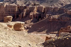 Images Dated 29th November 2022: Kazakhstan, Charyn Canyon, an old bus drives through the canyon