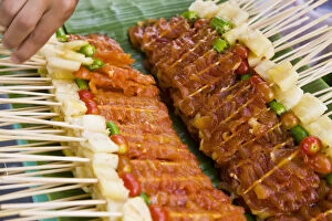 Images Dated 15th July 2009: Kebabs, skewered meat for barbecue on street stall, Bangkok, Thailand