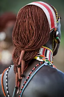 C Ulture Prints: Kenya, Laikipia, Ol Malo. A Samburu warriors hair is ochred and tied up in braids at a dance at a