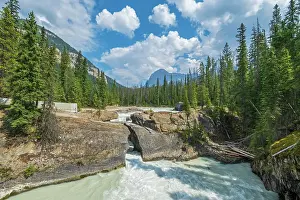 Pacific Coast Prints: The Kicking Horse River formed by the erosion of the limestone rock that created The Natural Bridge