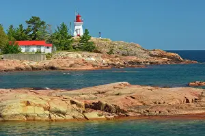Killarney East Lighthouse on Red Rock Point of Georgian Bay (Lake Huron). Precambrian shield Killarney, Ontario, Canada