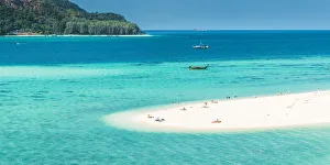 Ko Lipe, Satun Province, Thailand. Tourists on a white beach strand