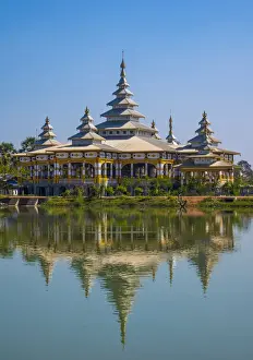 Southeast Prints: Kyaut Ka Lat Buddhist Temple reflecting in the water of the lake at Hpa-An, Myanmar