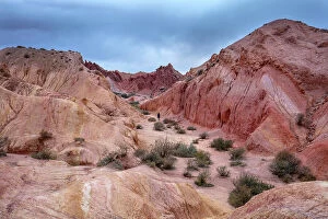Images Dated 28th November 2022: Kyrgyzstan, Issyk Kul Lake, Fairytale canyon (Skazka canyon), a person walks through the red canyon