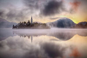 Lake Bled and Bled Island with the Assumption of Mary's Pilgrimage Church at dawn