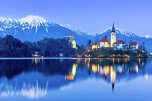 Lake Bled Prints: Lake Bled, Bled Island and Bled Castle with Snow Capped Julian Alps at Dusk