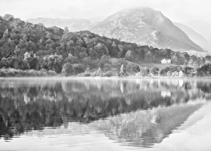 Lake Grasmere in the morning mist, Cumbria, UK