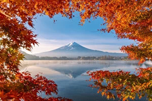Japanese Gallery: Lake Kawaguchi and Mt Fuji framed by red maple leaves in autumn, Yamanashi Prefecture