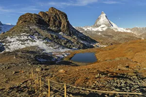 Images Dated 20th April 2022: Lake Riffelsee with Matterhorn (4478m), Zermatt, Valais, Swiss Alps, Switzerland