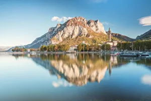 Lakefront of Lecco reflected in Como Lake at autumn, Lecco, Lombardy, Italy