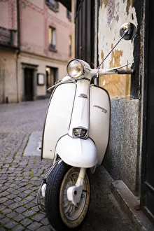 Motorcycle Prints: Lambretta Innocenti scooter in the old alley, Morbegno, province of Sondrio, Valtellina
