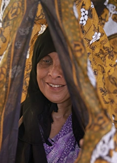 African Woman Gallery: A Lamu woman demonstrates the use of the shiraa
