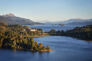 Rio Negro Prints: Landscape view over the Nahuel Lapi Lake and the luxury Llao Llao Hotel at sunrise