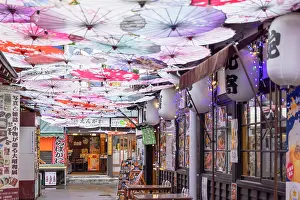 Hokkaido Prints: Lane with restaurants and decorative umbrellas, Otaru, Hokkaido, Japan