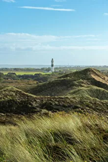 Images Dated 12th January 2023: Langer Christian lighthouse and grass covered dune landscape, Kampen, Sylt, Nordfriesland