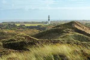 Kampen Prints: Langer Christian lighthouse and grass covered dune landscape