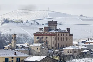Langhe, Cuneo district, Piedmont, Italy. Langhe wine region winter snow, Barolo castle