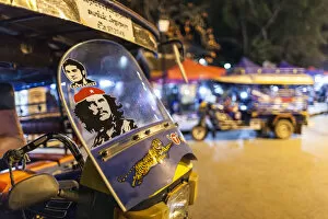 Images Dated 2nd February 2018: Laos, Luang Prabang, Sisavangvong Road, Handicraft Night Market, tuk-tuk motorcycle taxi
