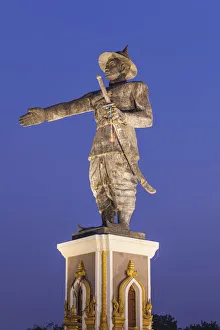 Images Dated 6th September 2018: Laos, Vientiane, Mekong Riverfront, statue of former Laotian King Chao Anouvong, dawn