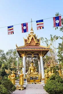 Images Dated 24th June 2014: Laos, Vientiane. Small votive altar inside Wat Sisaket temple complex