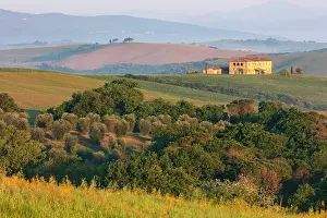 Rolling Landscape Prints: Large old farmhouse in the rolling landscape