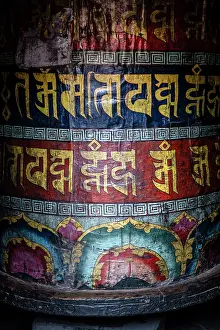 Nepal Prints: Large prayer wheel in the Buddhist monastery at Kagbeni, Lower Mustang, Nepal