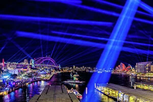 Images Dated 29th August 2023: Laser light show over Harbour Bridge and Opera House during the Vivid Sydney festival, Sydney