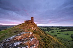 Images Dated 23rd March 2021: Late evening sunlight glowing on Brentor Church, Dartmoor National Park, Devon, England