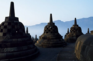 Latticed stupas on upper terraces, Borobodur temple, Java, Indonesia
