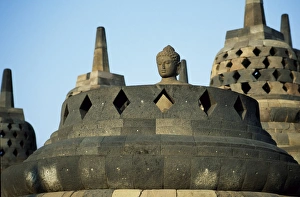 Latticed stupas on upper terraces, Borobodur temple, Java, Indonesia