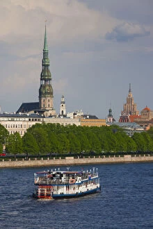 Images Dated 7th September 2010: Latvia, Riga, Daugava River tourist boat and Riga skyline