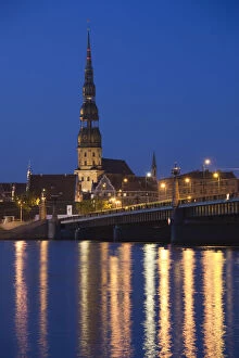 Images Dated 7th September 2010: Latvia, Riga, Old Riga, St. Peters Lutheran Church and Akmens Bridge, evening